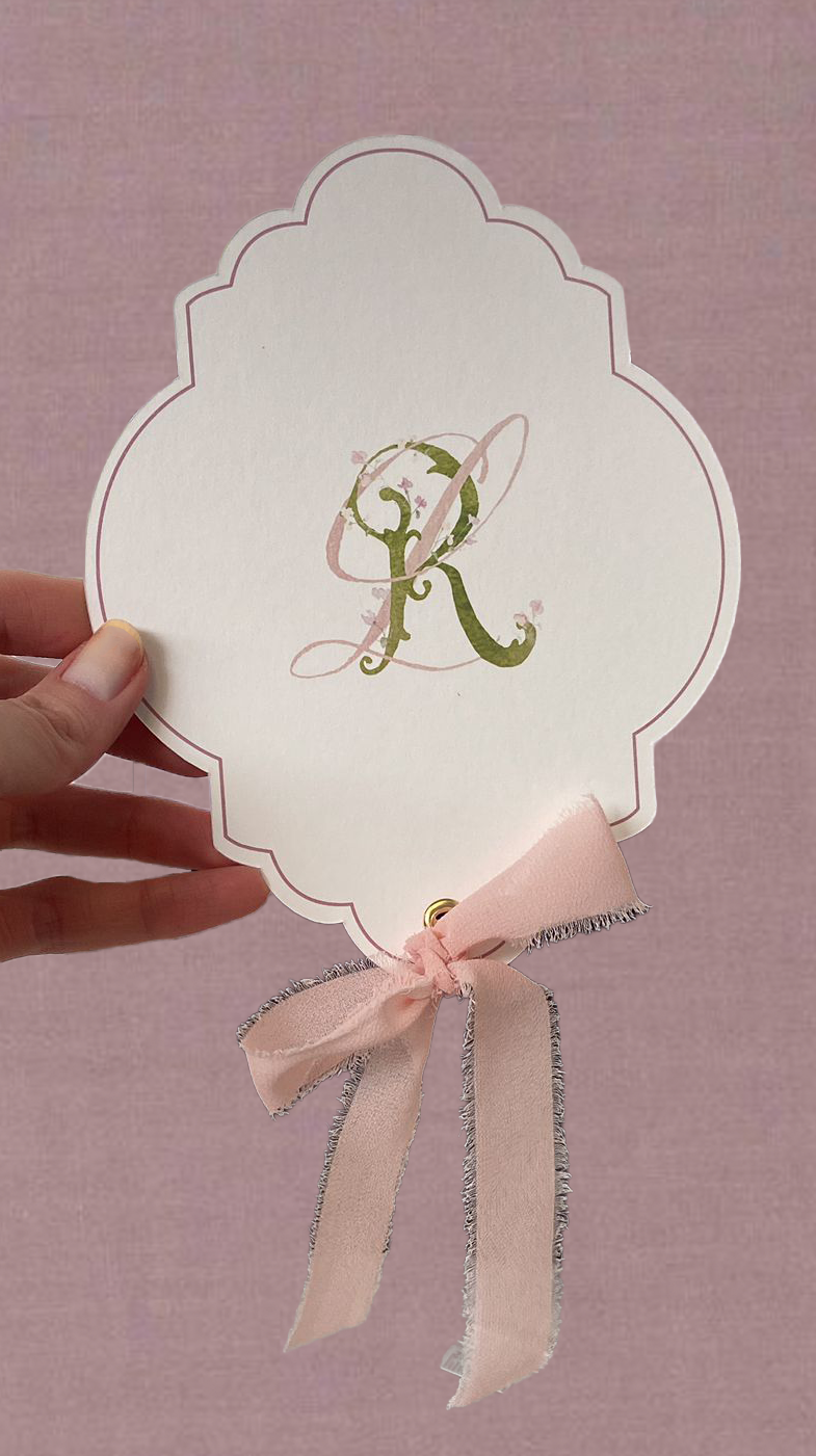 Louise & Rory's Scalloped Edge Order Of Service Cards with a Raw-Edge Shell Pink Ribbon for their Summer Wedding in Cashel Palace Hotel